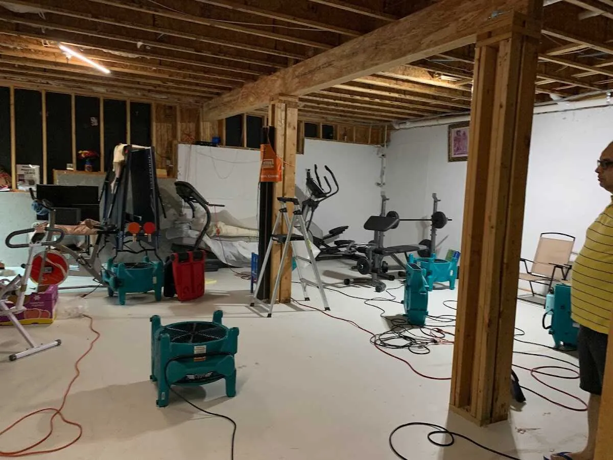 Basement drying equipment setup for Contents Cleaning & Restoration in Nibley